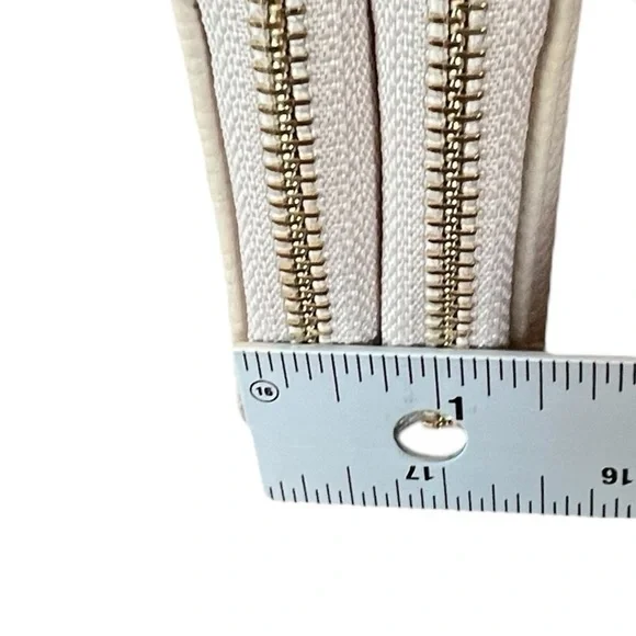 Under One Sky Wristlet Ivory with leather flower cut outs - Picture 8 of 11